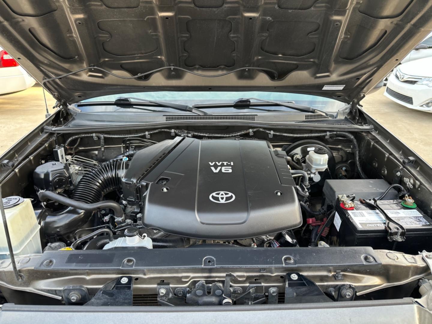 2012 Brown /Silver Toyota Tacoma SR5 (5TFJU4GN5CX) with an 4.0L engine, Automatic transmission, located at 1501 West 15th St., Houston, 77008, (713) 869-2925, 29.797941, -95.411789 - Photo#11